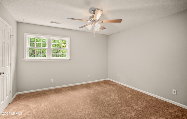 21 Planters Cir, Beaufort, SC 29907 - empty room with a ceiling fan, carpet floors, and a textured ceiling