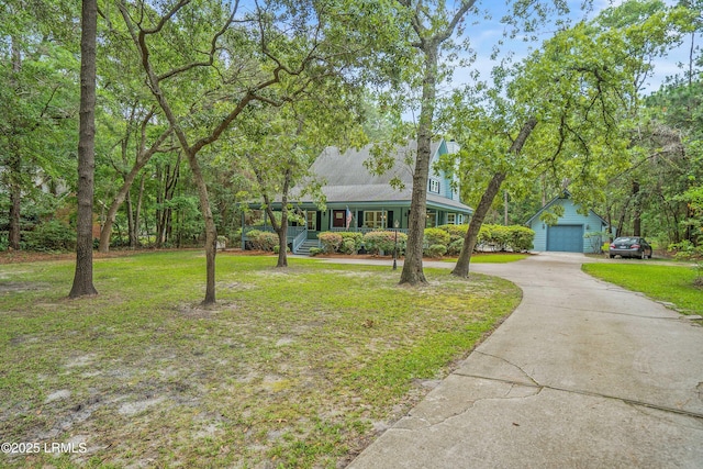 21 Planters Cir, Beaufort, SC 29907 - view of front of home featuring an outdoor structure, driveway, a front lawn, and a porch