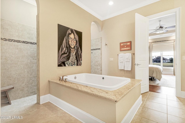 bathroom featuring tile patterned flooring, ornamental molding, and separate shower and tub