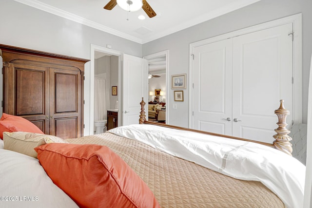 bedroom with crown molding, ceiling fan, and ensuite bath