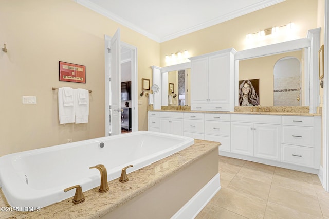 bathroom featuring vanity, a tub to relax in, tile patterned floors, and ornamental molding