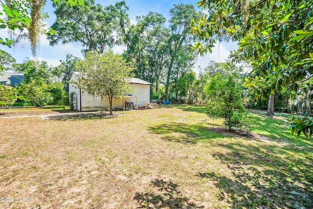 2211 Wilson Dr, Beaufort, SC 29902 - view of green lawn with an outdoor structure