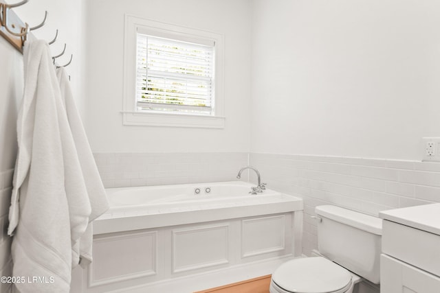 2211 Wilson Dr, Beaufort, SC 29902 - full bath with a bath, vanity, wainscoting, and tile walls