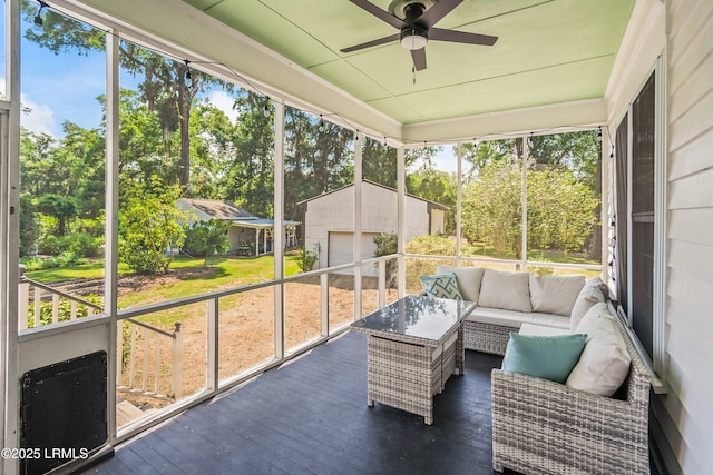 2211 Wilson Dr, Beaufort, SC 29902 - sunroom featuring a ceiling fan, outdoor lounge area, and view of wooded area