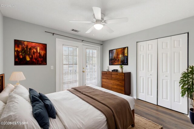 bedroom with visible vents, ceiling fan, dark wood finished floors, french doors, and a closet