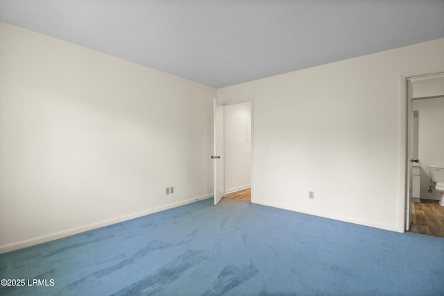 5 Gumtree Rd Unit I-32, Hilton Head Island, SC 29926 - unfurnished bedroom with carpet flooring and ensuite bathroom