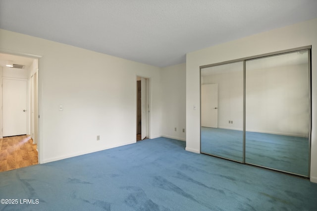 5 Gumtree Rd Unit I-32, Hilton Head Island, SC 29926 - unfurnished bedroom featuring carpet and a closet