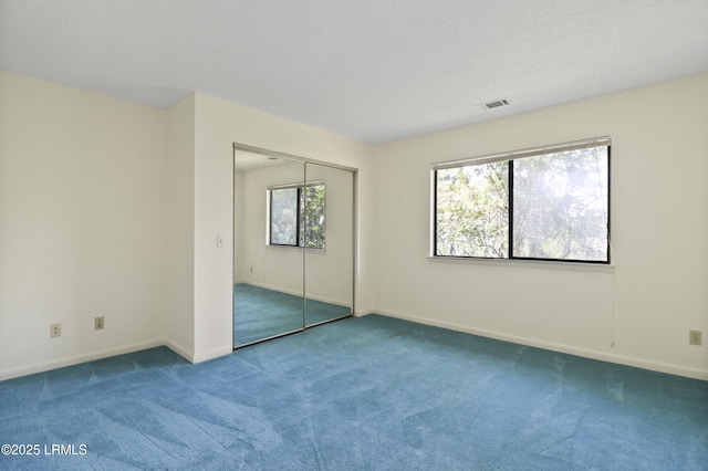 5 Gumtree Rd Unit I-32, Hilton Head Island, SC 29926 - unfurnished bedroom featuring carpet flooring and a closet