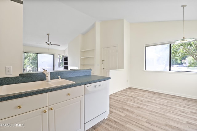 5 Gumtree Rd Unit I-32, Hilton Head Island, SC 29926 - kitchen featuring white dishwasher, dark countertops, vaulted ceiling, hanging light fixtures, and light wood finished floors