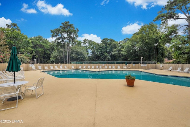 5 Gumtree Rd Unit I-32, Hilton Head Island, SC 29926 - community pool featuring a patio area and view of scattered trees