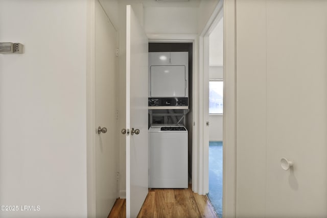 5 Gumtree Rd Unit I-32, Hilton Head Island, SC 29926 - hallway with stacked washer and clothes dryer and wood finished floors