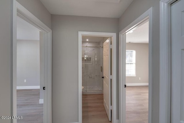 hall featuring light hardwood / wood-style flooring