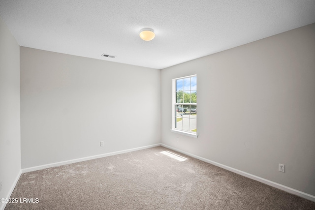 506 Cypress Cv, Bluffton, SC 29910 - carpeted empty room featuring baseboards and a textured ceiling