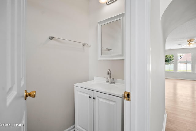 506 Cypress Cv, Bluffton, SC 29910 - bathroom featuring vanity, a ceiling fan, and wood finished floors