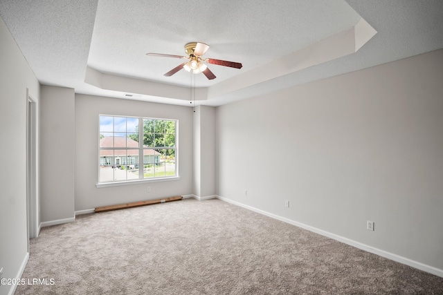 506 Cypress Cv, Bluffton, SC 29910 - carpeted empty room with a tray ceiling, a textured ceiling, and ceiling fan