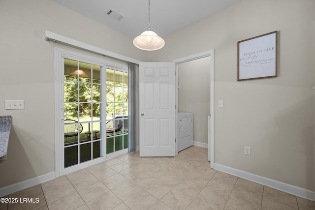 151 Bella Way, Beaufort, SC 29906 - unfurnished bedroom featuring washer / clothes dryer, light tile patterned floors, and access to outside