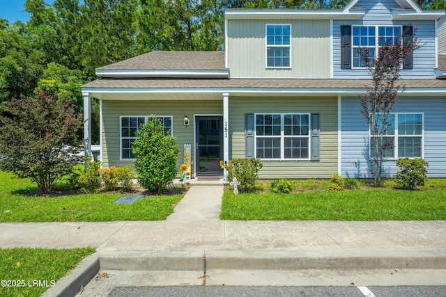 151 Bella Way, Beaufort, SC 29906 - view of front of property with roof with shingles, covered porch, and a front lawn