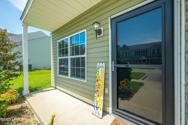 151 Bella Way, Beaufort, SC 29906 - view of exterior entry with a lawn