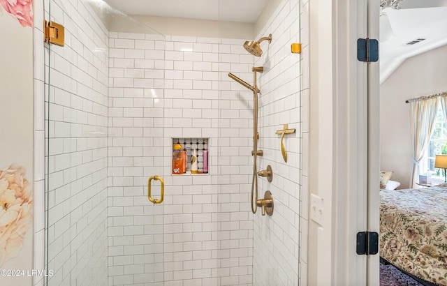 bathroom with a shower with shower door