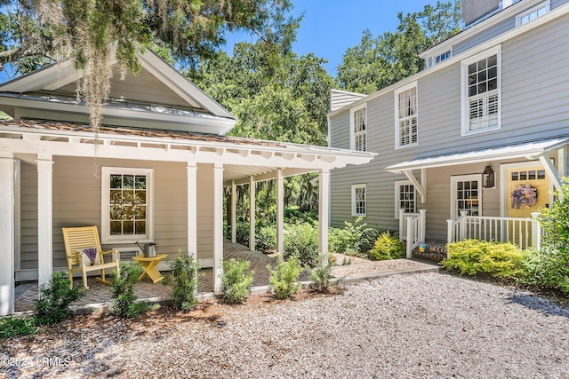 back of house with a porch