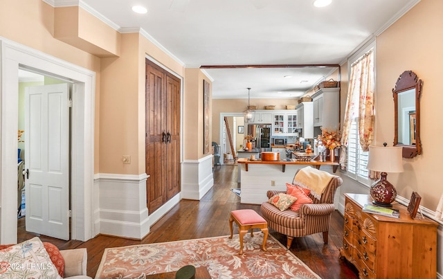 living room with crown molding and dark wood-type flooring