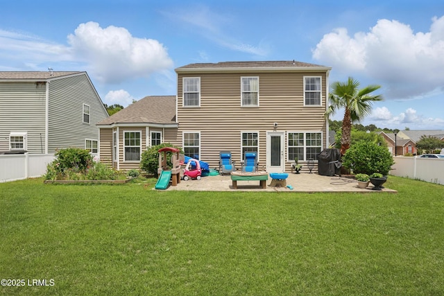 2239 Blakers Blvd, Bluffton, SC 29909 - back of property with a patio, a playground, and roof with shingles