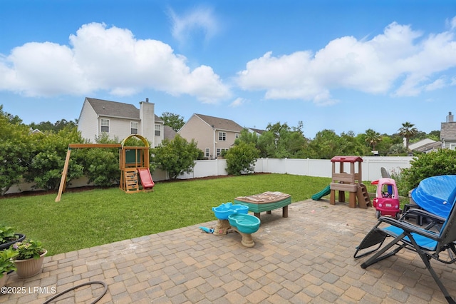 2239 Blakers Blvd, Bluffton, SC 29909 - view of playground with a patio area and a residential view