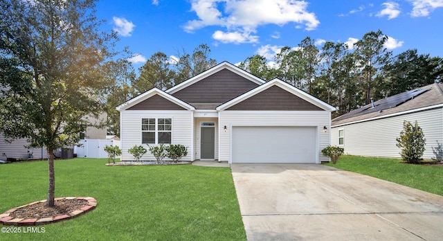 view of front facade with a garage and a front lawn