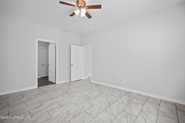 unfurnished bedroom featuring ceiling fan