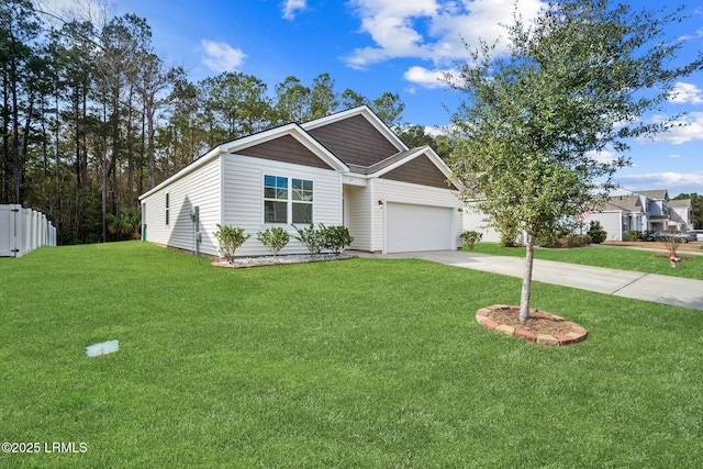 view of front of home featuring a garage and a front lawn