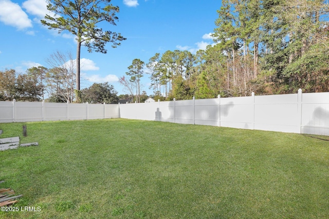 view of yard featuring a fenced backyard