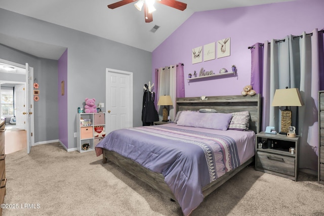 carpeted bedroom featuring vaulted ceiling, ceiling fan, visible vents, and baseboards