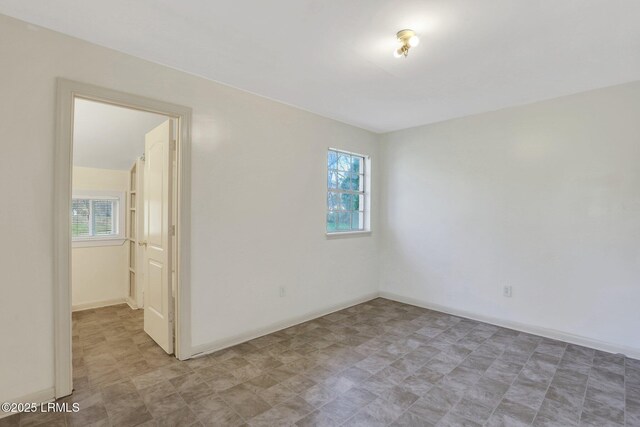144 Middlefield Cir, Seabrook, SC 29940 - spare room featuring baseboards