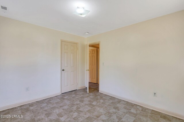 144 Middlefield Cir, Seabrook, SC 29940 - empty room featuring baseboards