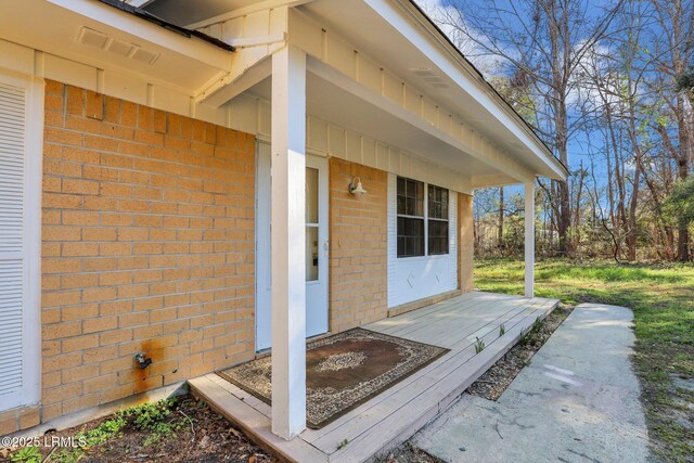 144 Middlefield Cir, Seabrook, SC 29940 - property entrance featuring brick siding