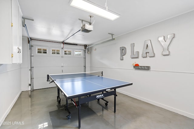 rec room featuring concrete flooring