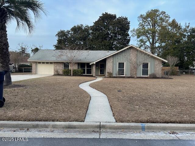 single story home with a garage