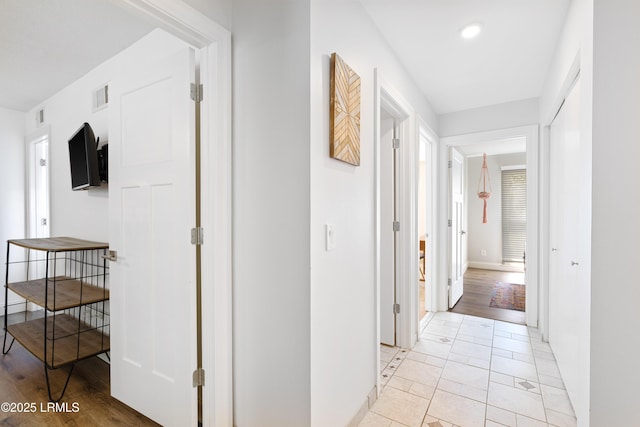 hall featuring light wood-type flooring