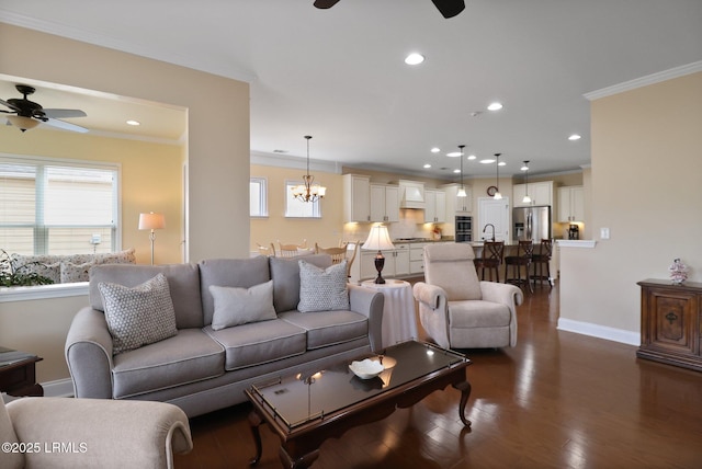 198 Knollwood Ct, Okatie, SC 29909 - living room with ceiling fan, ornamental molding, baseboards, plenty of natural light, and dark wood-type flooring