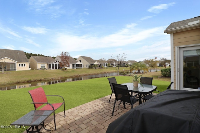 198 Knollwood Ct, Okatie, SC 29909 - view of patio / terrace with a water view, a residential view, and outdoor dining area