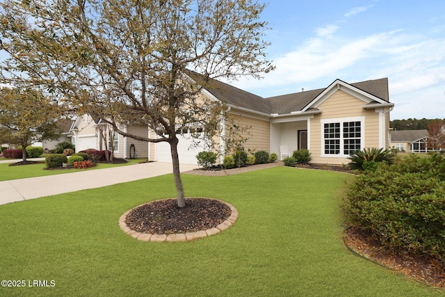 198 Knollwood Ct, Okatie, SC 29909 - view of front of home featuring concrete driveway, an attached garage, a front lawn, and a shingled roof