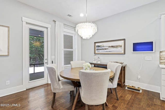 397 Hampton Lake Dr, Bluffton, SC 29910 - dining room with baseboards, dark wood-style floors, and a chandelier