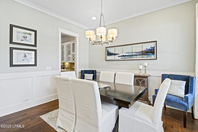 397 Hampton Lake Dr, Bluffton, SC 29910 - dining room featuring dark wood finished floors, a chandelier, crown molding, recessed lighting, and a wainscoted wall