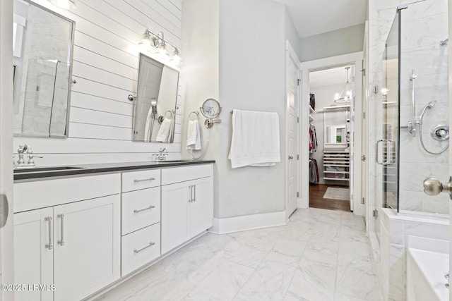 397 Hampton Lake Dr, Bluffton, SC 29910 - bathroom with marble finish floors, a shower stall, double vanity, a walk in closet, and a bathtub
