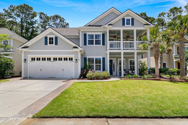 397 Hampton Lake Dr, Bluffton, SC 29910 - view of front of house with concrete driveway, a front yard, a balcony, an attached garage, and a porch