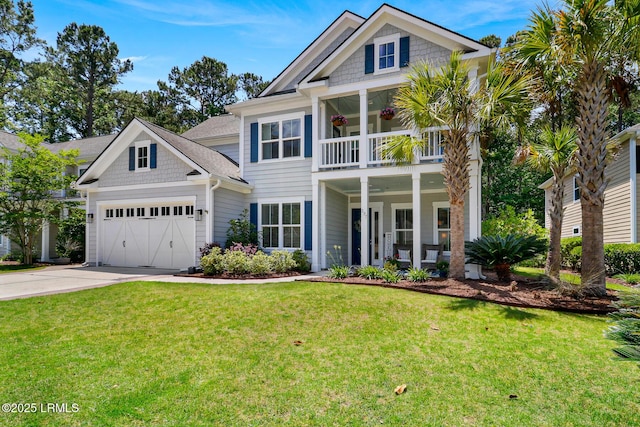 397 Hampton Lake Dr, Bluffton, SC 29910 - view of front of home featuring an attached garage, concrete driveway, a balcony, and a front lawn