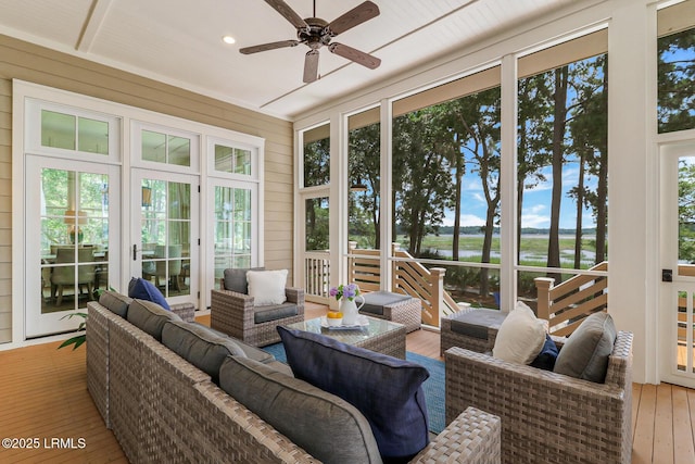 24 Carrier Blf, Bluffton, SC 29909 - sunroom / solarium featuring a water view, a ceiling fan, and an outdoor living space