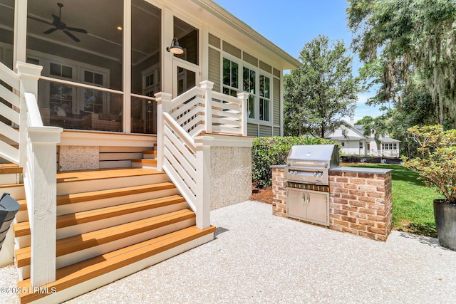 24 Carrier Blf, Bluffton, SC 29909 - view of patio featuring an outdoor kitchen, ceiling fan, and stairway