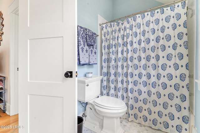 24 Carrier Blf, Bluffton, SC 29909 - bathroom with a shower with shower curtain and wood finished floors