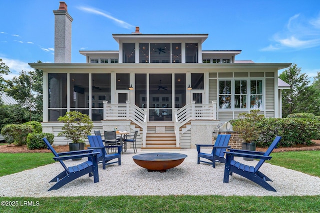 24 Carrier Blf, Bluffton, SC 29909 - rear view of house featuring a sunroom, an outdoor fire pit, ceiling fan, a patio area, and stairs